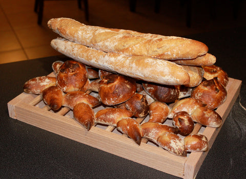 Traditional French Baguettes baked in a wood-fired brick oven