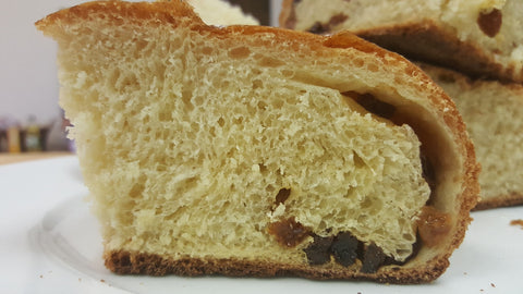 close up view of challah bread with raisins