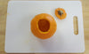 empty mini pumpkin and cutting board