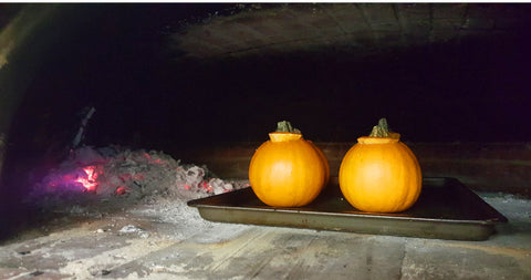 mini pumpkins in a wood fired oven