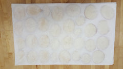 potato slices drying on paper towels