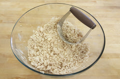 butter oats and flour blended together in a mixing bowl