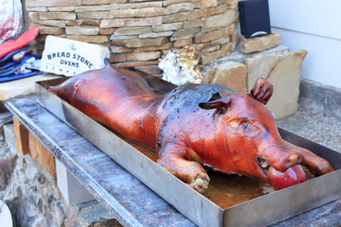 Whole Pig Roasted in a Wood-Fired Brick Oven